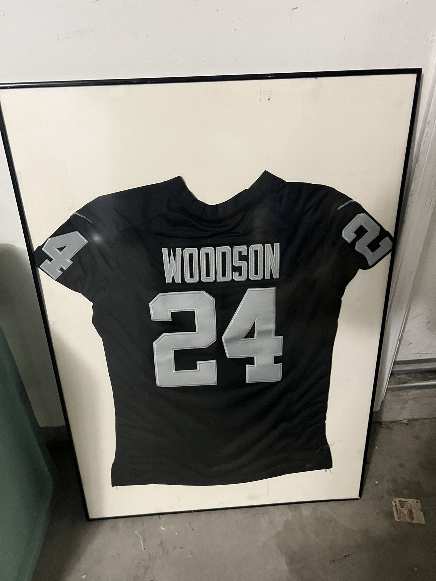 Oakland Raiders Charles Woodson Jersey In Frame 