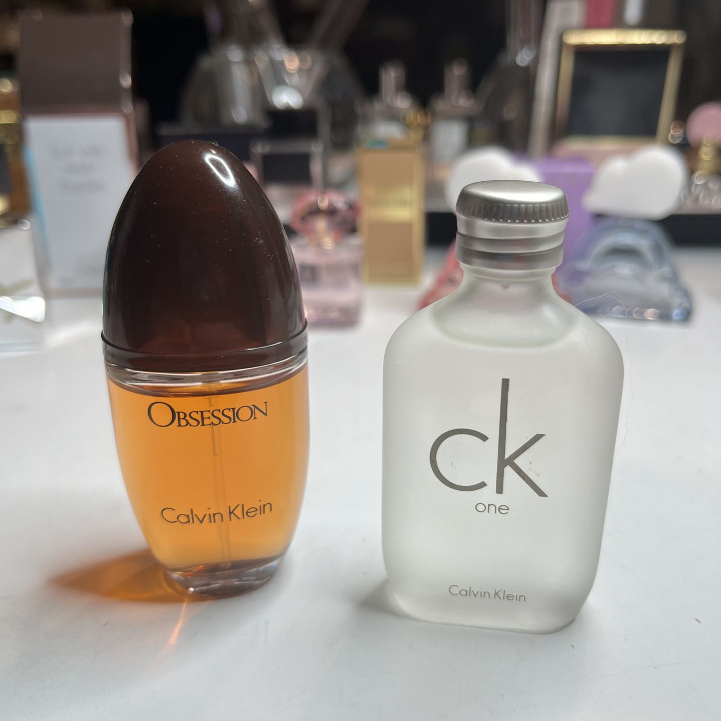 Pending Pick Up. 2 mini/Travel Size Perfume and Cologne Obsession/ CK One By Calvin Klein