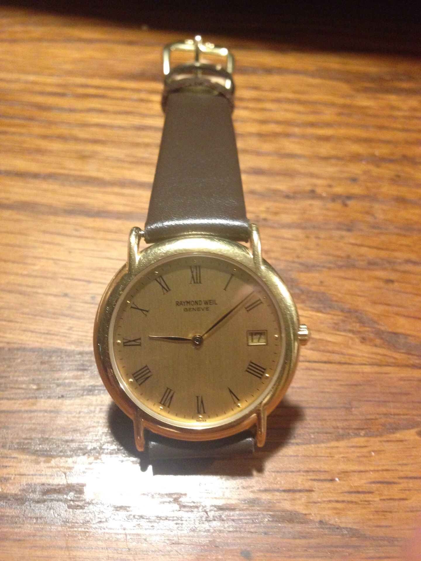 RAYMOND WEILL, GENEVE, QUARTZ, SWISS, MADE, WITH DATE, DE LUXE, WATCH, ALL GOLD TONE, VERY THIN, LIKE A COIN, THE WATCH , WORKS, PERFECTLY,