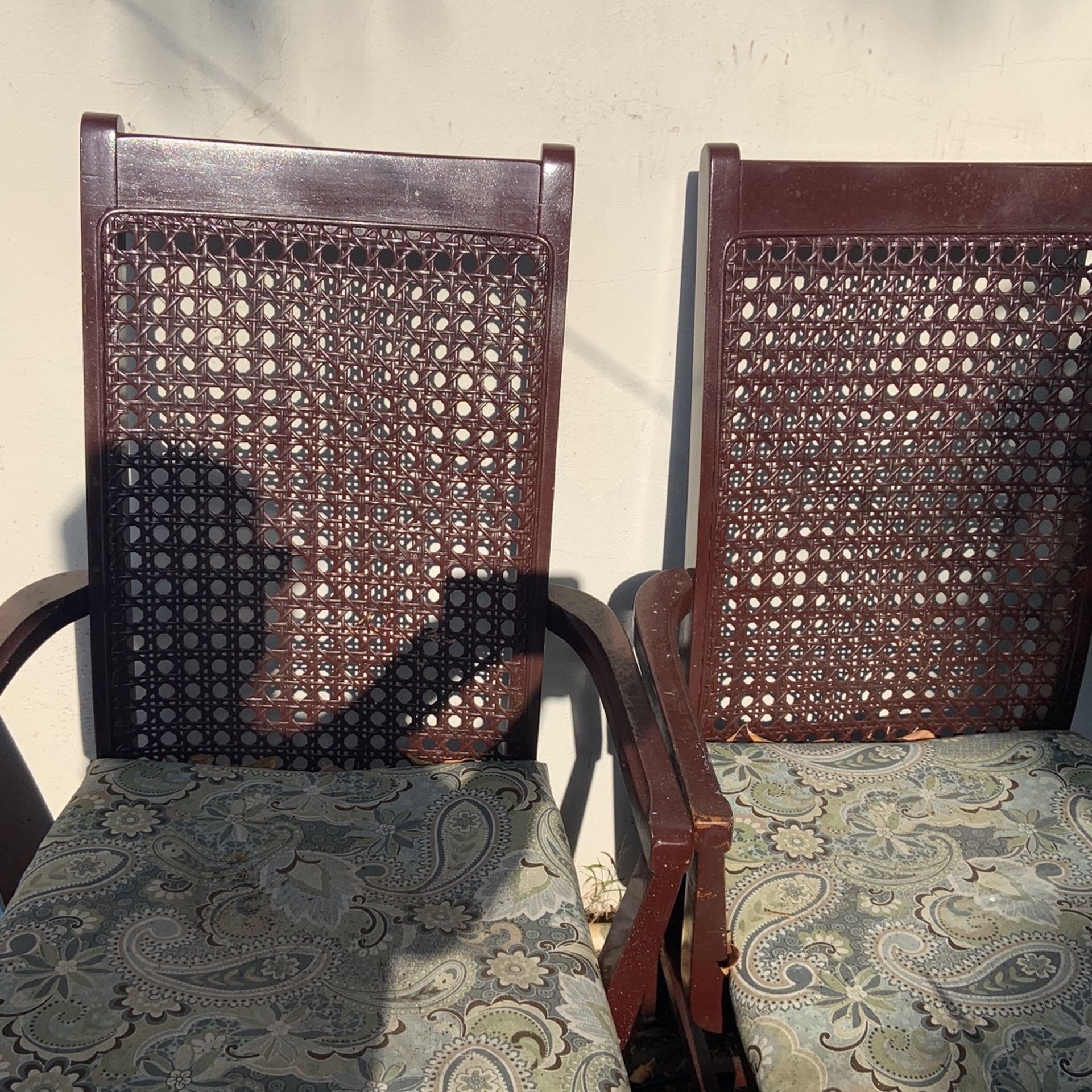 Solid wood, two Arm Cane Chairs From The 70’s...chairs need restoring...cane In Good Condition