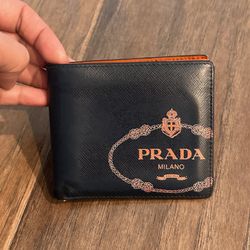 PRADA NAVY SAFFIANO LEATHER ORANGE SILKSCREEN LOGO WALLET