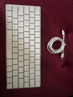 Apple Bluetooth Magic Keyboard Model A1644 with connection cable in good working condition