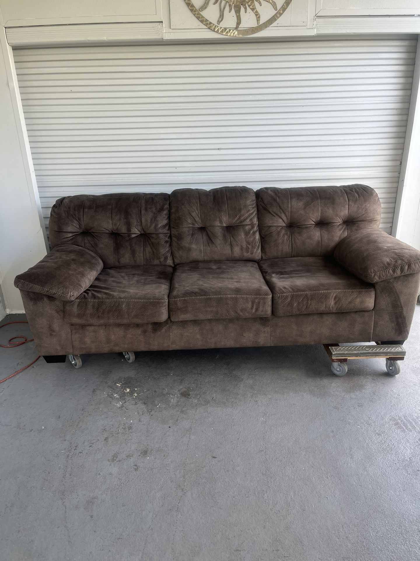 Brown cloth couch