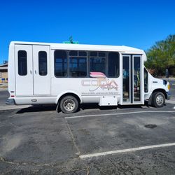 White Passenger Shuttle Bus with Wheelchair Lift