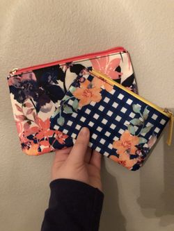 Two zip up pouches
