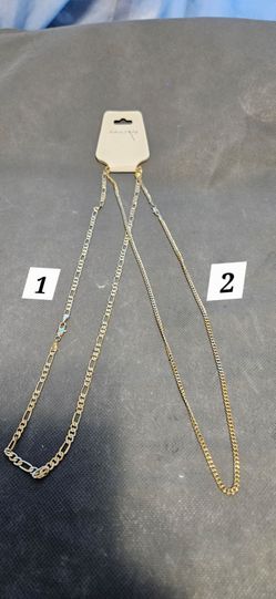 Assorted Gold and Silver Tone Figaro and Curb Link Necklaces. $10 Each