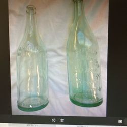 2 antique green glass bottles, 28 fluid ounces,