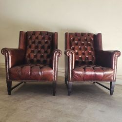 tufted  leather chairs