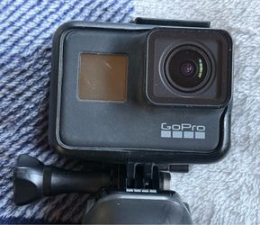 Go Pro Black 7 with batteries and other assessors