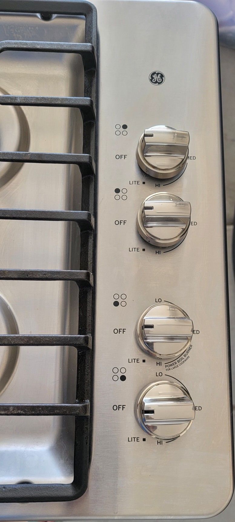GE slightly used 4 burner cooktop