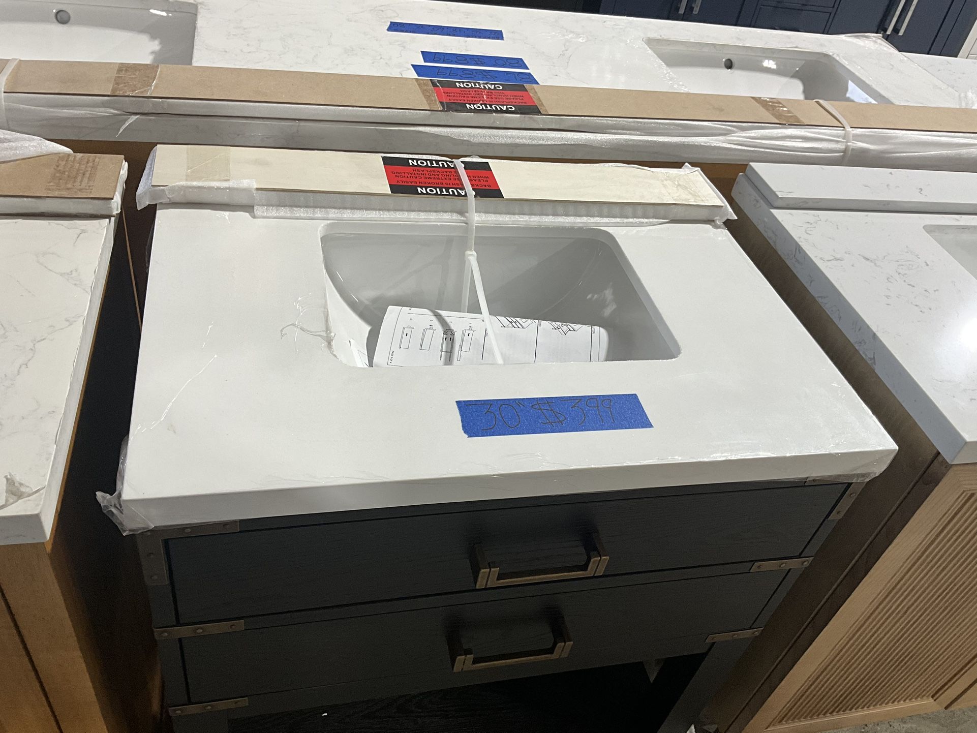 30” Bathroom Vanity in black , single sink soft close solid wood with vanity top in white $399 Luke’s liquidations warehouse Address: 2434 N Forsyth