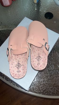 Pink clogs
