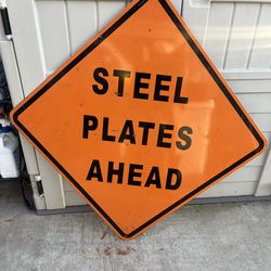 Steel plates ahead sign