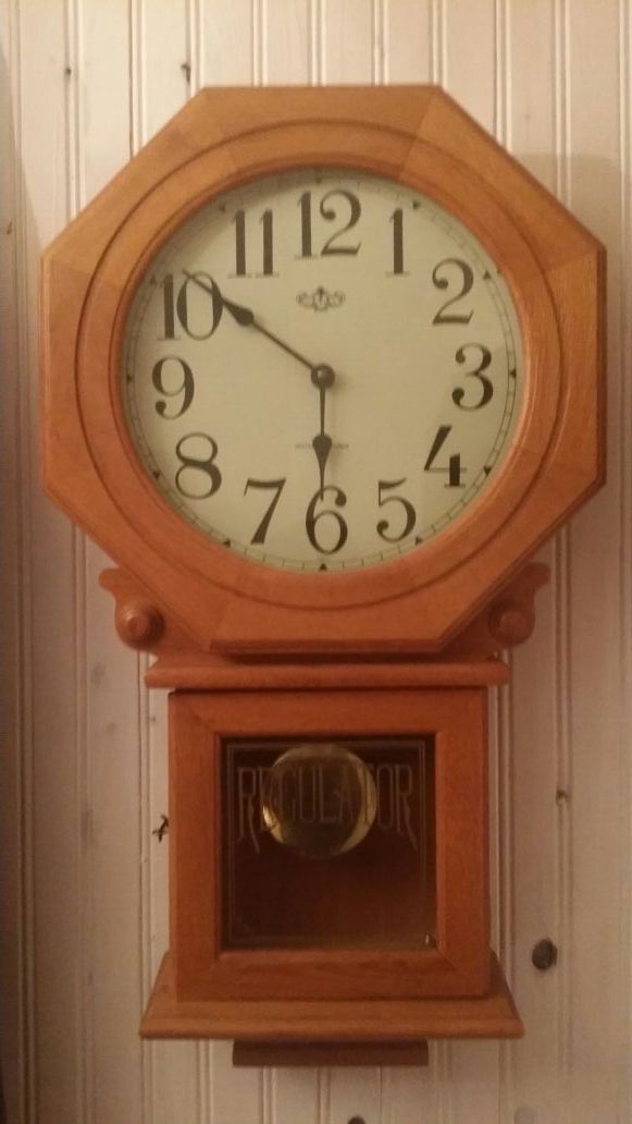 Antique Westminister wall Clock plays melody and has moving pendulum