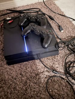 PS4 With Two Controllers And Games