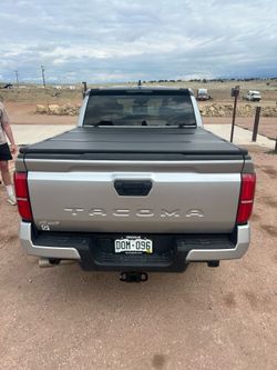 Truck bed tri fold topper