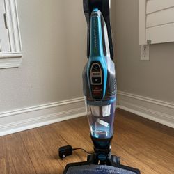 New Unused Bissell Cordless Pet, 3061 Featherweight Stick Vacuum