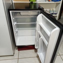 Small. Refrigerator 31" Inches High 20" Inches Long 20 "Inches Dept 