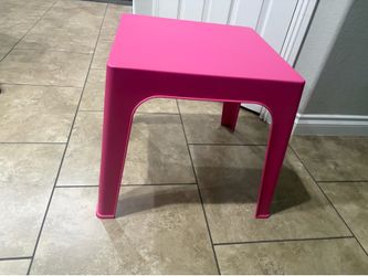 Pink plastic stand