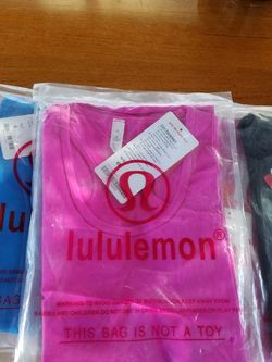 Lululemon tops . Various sizes.