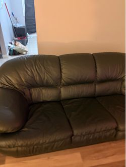 Green sofa and love seat