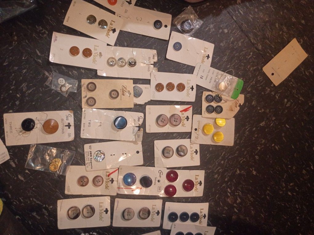 Buttons Buttons And More Buttons Thread Mostly New Sewing Machine Needles and a Montgomery Ward Sewing Machine 1977