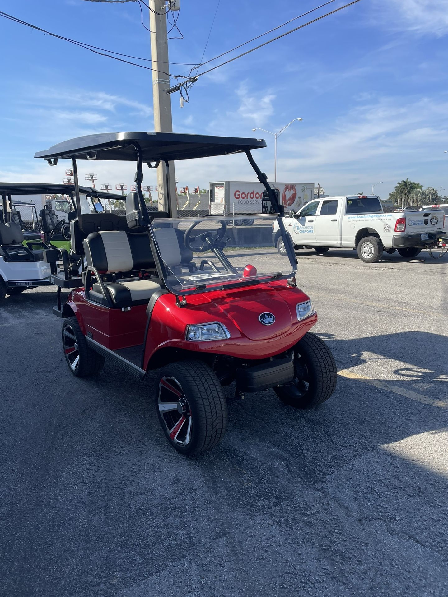 New Evolution Golf Carts + Free Christmas Village (While. Supply Last)