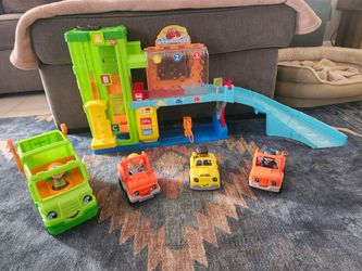 Fisher price car wash plus extra cars