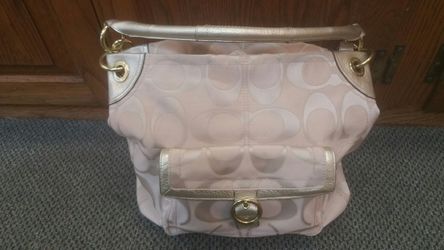 Pink and gold Coach purse