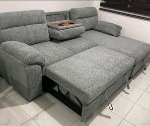 Gray chenille sectional pullout sleeper bed