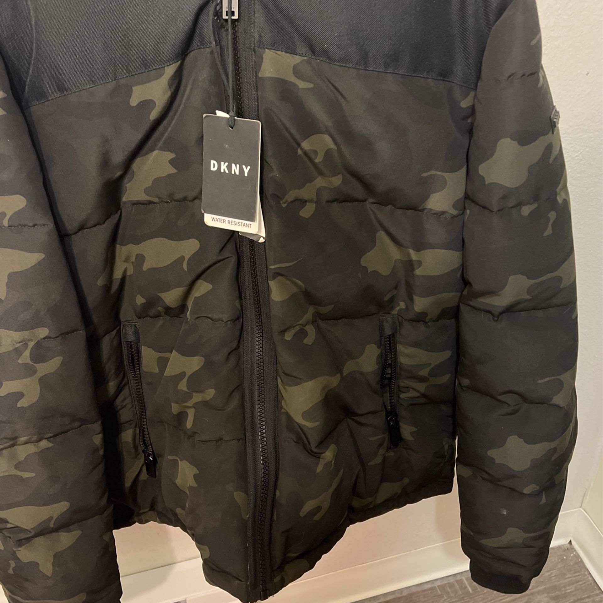 DKNY Water Resistanct Outer Shell, ulta Loft Insulation(down