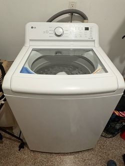LG Washer WT7005CW and Electric Dryer DLE7000W Set