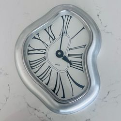 Vintage Kirch Verichron Brushed  Metal Surrealist Dali Melting Face Wall Clock Taiwan  13 3/4” tall x 10 1/2” w
