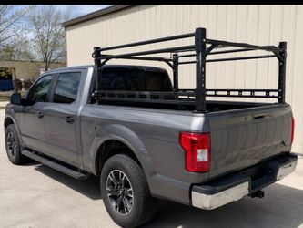 Truck bed rack/cage adjustable