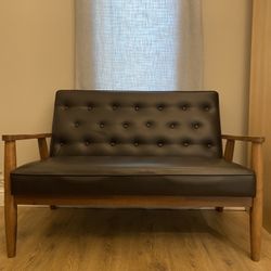 Leather upholstered wooden 2 seater