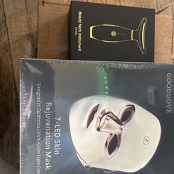 Seven LED face mask and a face massager brand new