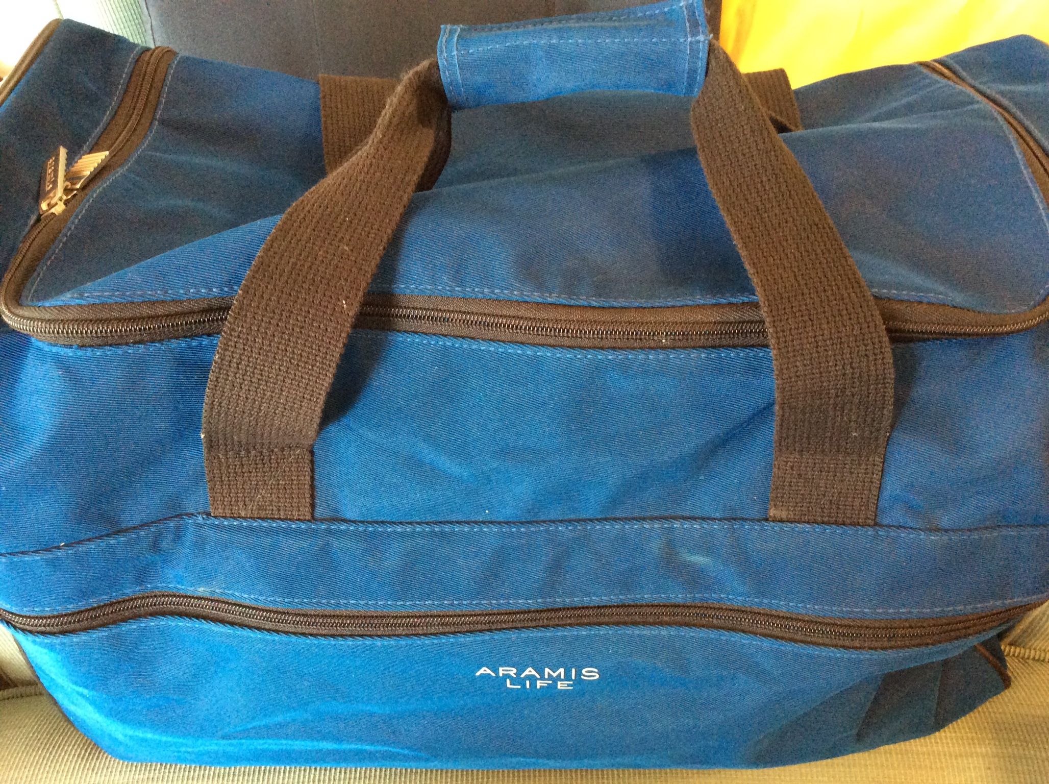 Bag, USED, 19 1/2 long, by 13 1/2 deep, zip top, zip large front pocket, 2 Velcro side pockets, Maryville Meet