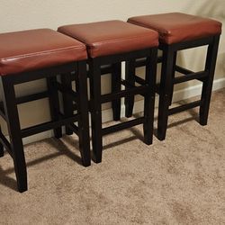 THREE. CUSHIONED. STOOLS