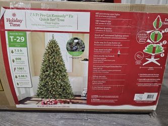 Barely used great condition fake 7.5 ft Christmas tree with stand.