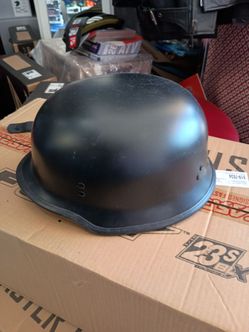 Size extra large German style DOT approved helmet fly 9mm. We use it for a photo shoot for our shop.