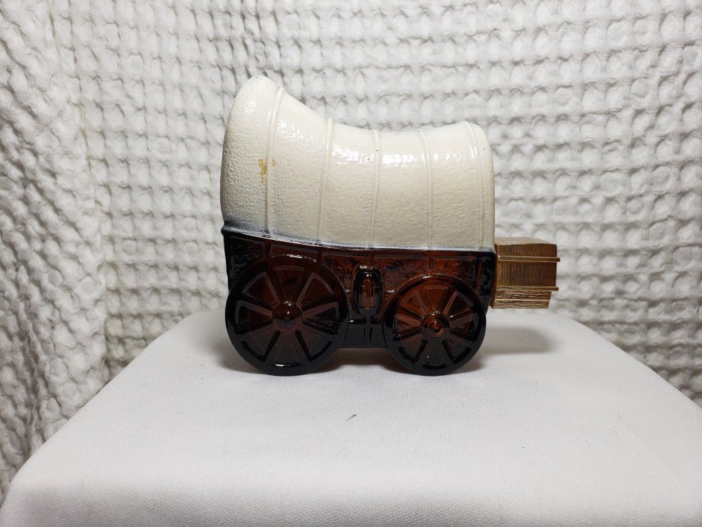 Vintage Avon Covered Wagon Glass Decanter Wild Country BOTTLE (EMPTY) . Good condition . Decanter measures 3 3/4" T X 4 3/4" L
