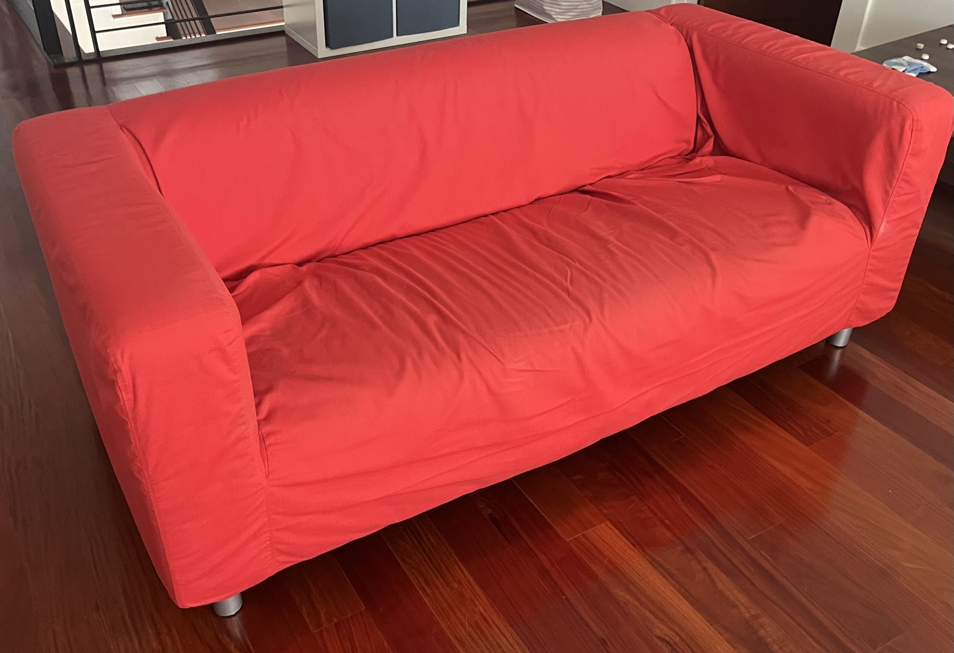 Red Ikea Klippan Sofa FS. Includes washable red cover.