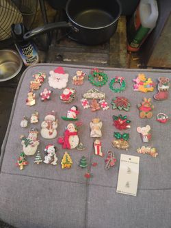 Christmas Pins some jeweled, some ceramic and some wooden