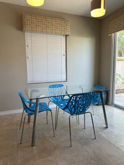 Glass Top Table with chrome Frame with 4 Chairs