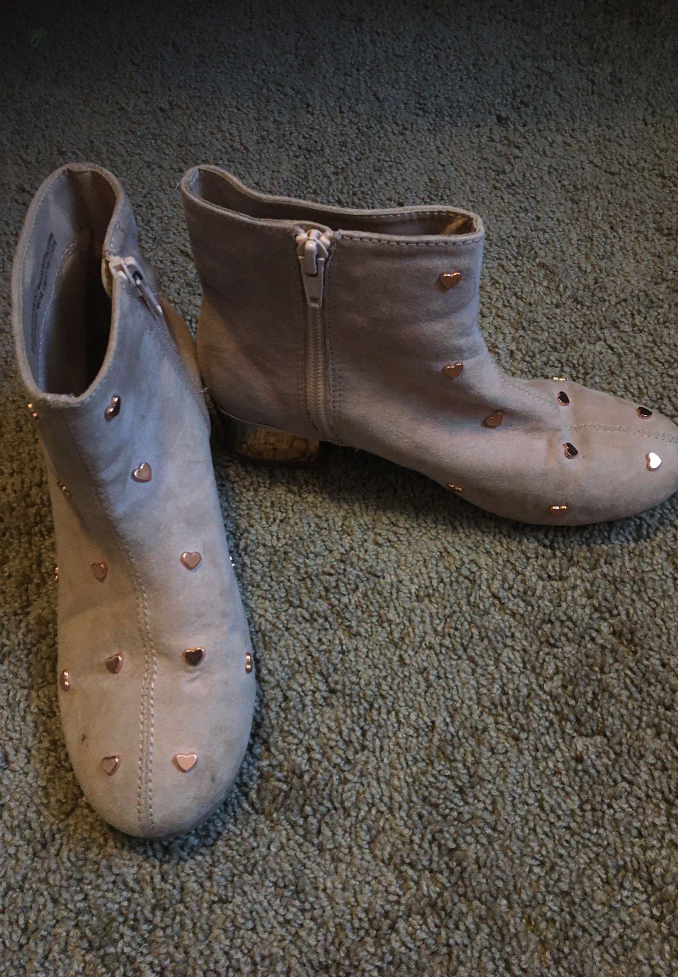 Children place girl shoes