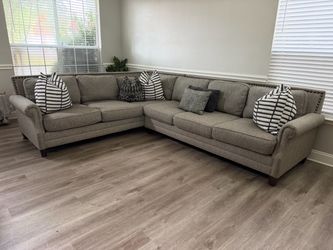 Studded gray sectional sofa set