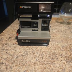 Vintage Polaroid Camera Sun600