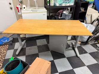 Adjustable height wood table, metal base. IKEA