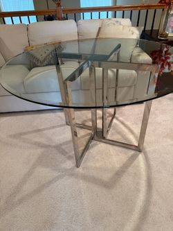 48” beveled glass top dining table with chrome base  mint condition