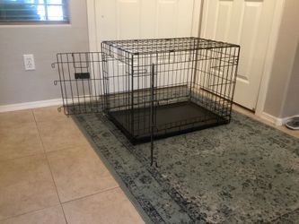 Collapsible dog cage/crate/carrier 30 inches long 22 inches tall 19 inches wide   (nearly new condition)